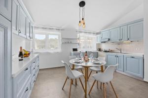 Kuchyň nebo kuchyňský kout v ubytování Apartmani Paliska