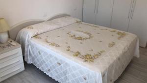 Ένα ή περισσότερα κρεβάτια σε δωμάτιο στο Camera Il gabbiano +4 φωτογραφίες