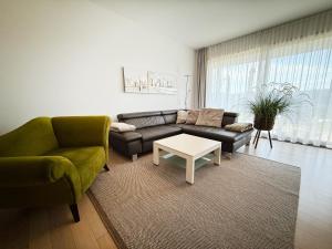 Posezení v ubytování Apartment am Weinberg