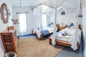 Postel nebo postele na pokoji v ubytování Hollow Tree's Resort + 79 fotografií