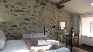 Postel nebo postele na pokoji v ubytování Beautiful house with pool and spa in Dordogne 3 bedrooms