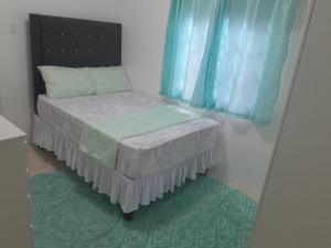 Postel nebo postele na pokoji v ubytování Serenity Corner