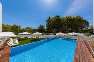 Bazén v ubytování Hotel Lux Fatima nebo v jeho okolí