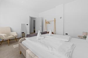 Postel nebo postele na pokoji v ubytování Apartmani Paliska