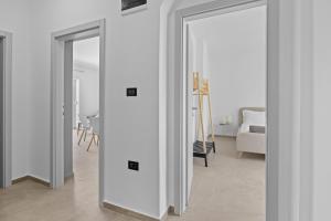 Postel nebo postele na pokoji v ubytování Apartmani Paliska