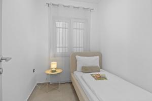 Postel nebo postele na pokoji v ubytování Apartmani Paliska