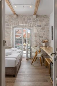 Casa Columba - 4 Star Design Boutique Hotel with Outdoor Pool & Private Garden客房内的一张或多张床位