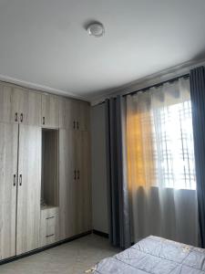 Un pat sau paturi într-o cameră la Have fun with it