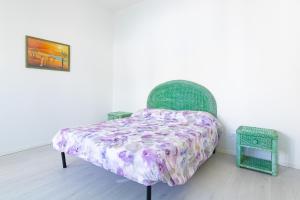 Postel nebo postele na pokoji v ubytování Appartamento Erica Mancaversa vista mare