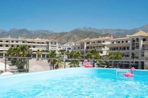 The swimming pool at or close to Edificio Resort Gran8Nerja