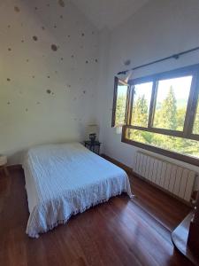 Postel nebo postele na pokoji v ubytování B&B Eguzkitza