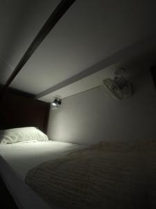 Postel nebo postele na pokoji v ubytování Cozy Inn Hostel