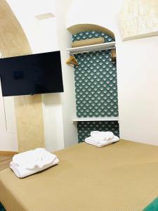 Μια τηλεόραση ή/και κέντρο ψυχαγωγίας στο Monasterium Suite