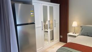 Postel nebo postele na pokoji v ubytování Guest suite in Beverly Hills Sodic
