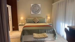 Postel nebo postele na pokoji v ubytování Guest suite in Beverly Hills Sodic
