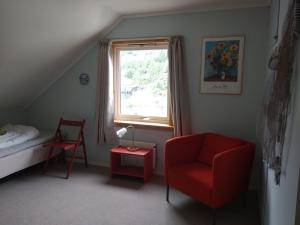 En eller flere senger på et rom på Hardanger Rom & Harmonium "The Green B&B"