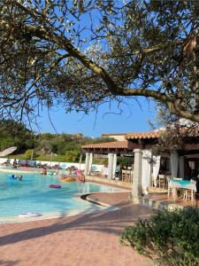 Bazén v ubytování Le Rocce Antiche Hotel Resort nebo v jeho okolí