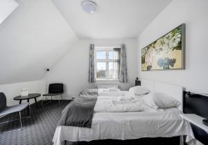 TV a/nebo společenská místnost v ubytování Hotel Søparken