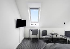 TV a/nebo společenská místnost v ubytování Hotel Søparken