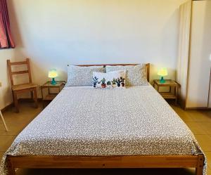 Posteľ alebo postele v izbe v ubytovaní Villa Carolea