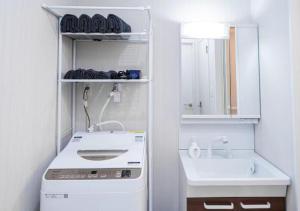 Ένα μπάνιο στο Kasai Light Luxury House 101