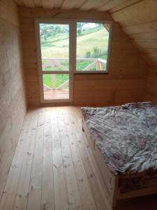Postel nebo postele na pokoji v ubytování Sadyba u Vani