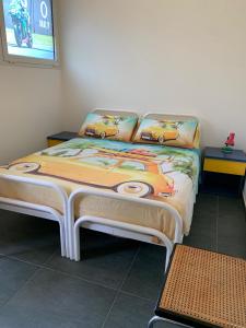 A bed or beds in a room at Rental rooms Antonella