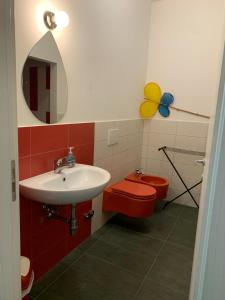 A bathroom at Rental rooms Antonella