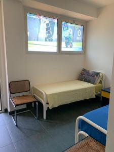 A bed or beds in a room at Rental rooms Antonella