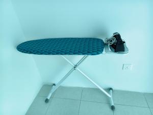 a table with a camera sitting on top of it at Stella Homestay in Kampong Bemban