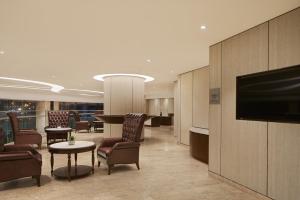 A television and/or entertainment centre at Four Points by Sheraton Danang