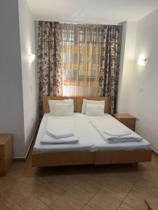Posteľ alebo postele v izbe v ubytovaní Esprit Hotel