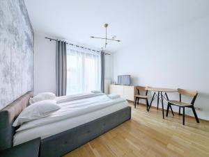 Turnau City Aparthotel客房内的一张或多张床位