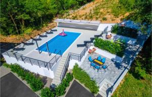 Πισίνα στο ή κοντά στο Stunning Apartment In Kostrena