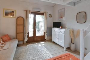 Μια τηλεόραση ή/και κέντρο ψυχαγωγίας στο La Mouvette - 10min de le Plage