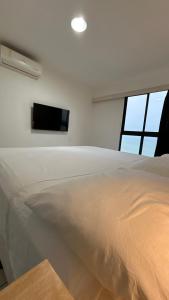 TV a/nebo společenská místnost v ubytování Ap Ponta Negra