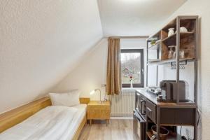 Postel nebo postele na pokoji v ubytování Gasthof Rhönlust