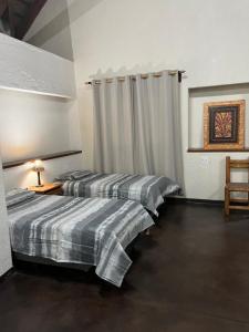 Ένα ή περισσότερα κρεβάτια σε δωμάτιο στο Soutpansberg Lodge Louis Trichardt