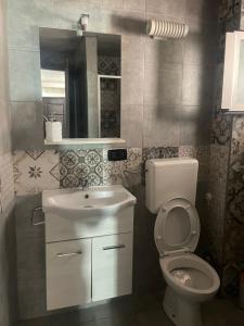 Koupelna v ubytování Xenia renting