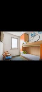 En eller flere senge i et værelse på Mancini house