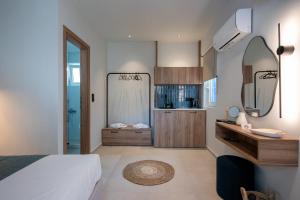 Posteľ alebo postele v izbe v ubytovaní Psaras Apartments