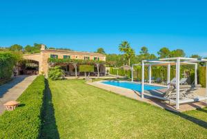 an estate with a swimming pool and a house at Es Rafal in Santa Margalida