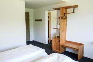 Postel nebo postele na pokoji v ubytování Hotel Vissenbjerg Storkro