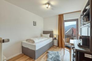 Postel nebo postele na pokoji v ubytování Gasthof Rhönlust