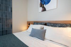 Posteľ alebo postele v izbe v ubytovaní Psaras Apartments