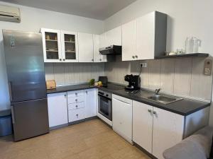 Kuchyň nebo kuchyňský kout v ubytování "DeeZee" Apartment