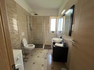 Koupelna v ubytování "DeeZee" Apartment