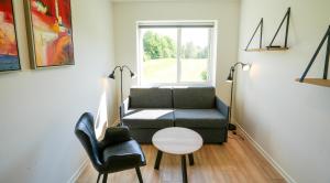 Posezení v ubytování Hotel Vissenbjerg Storkro