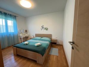 Postel nebo postele na pokoji v ubytování "DeeZee" Apartment