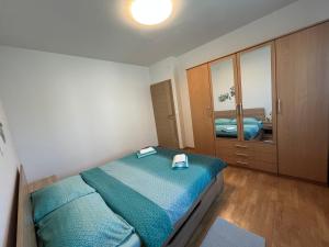 Postel nebo postele na pokoji v ubytování "DeeZee" Apartment